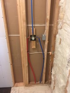 Hot and cold water supply installed for new custom tile shower