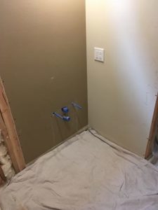 Hot and cold water supply and drain installed for new vanity.